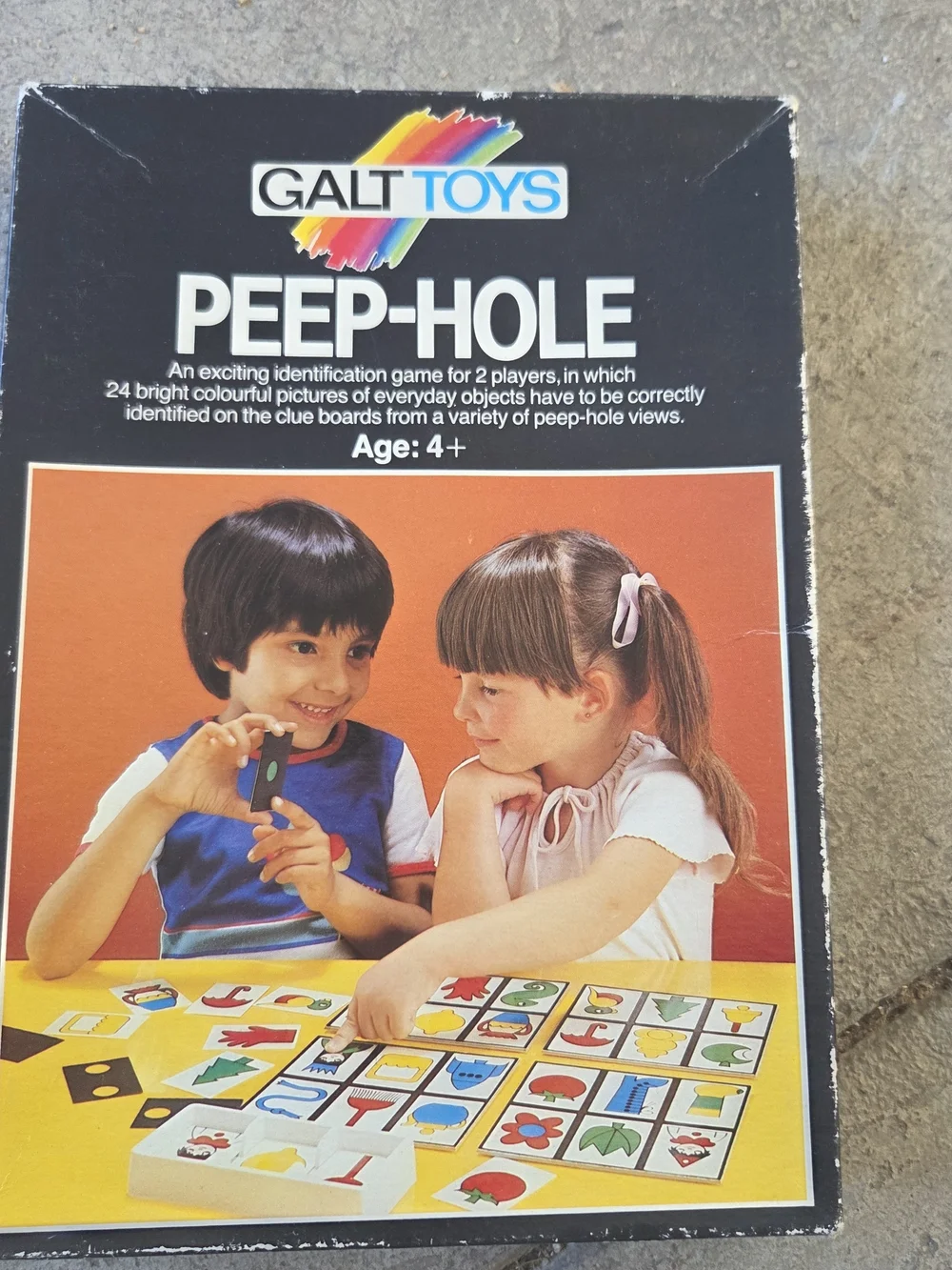 Peep-Hole Kids Board Game - Black with Multicolor Artwork